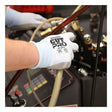 Someone wearing MCR Safety CutPro 18 Ga HyperMax PU Gloves (model 92718PU) is handling hoses attached to technical equipment, likely while performing maintenance or repair tasks.