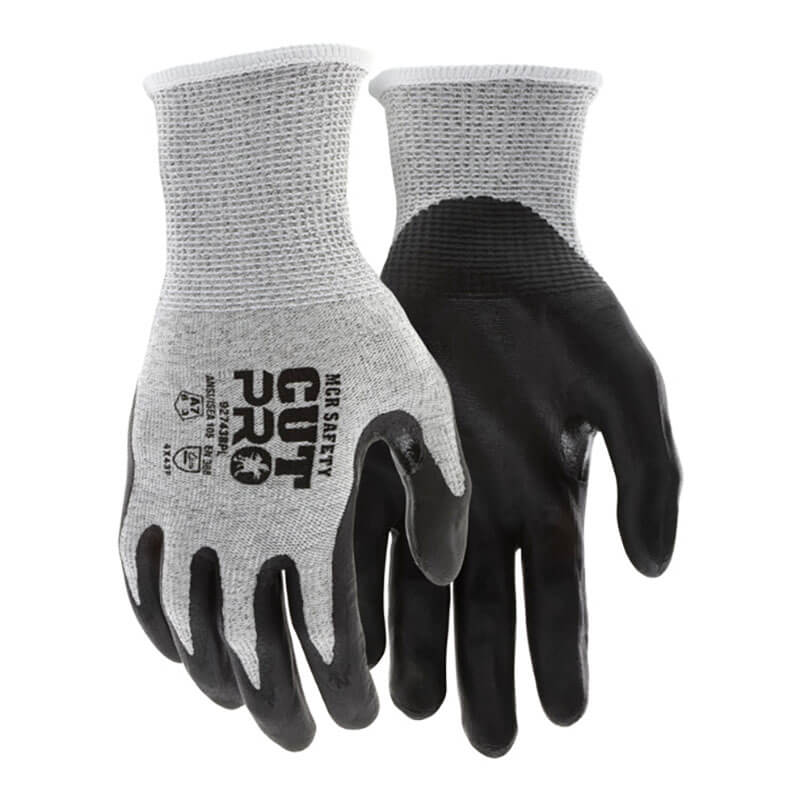 A dozen MCR Safety Cut Pro 13G HyperMax Bi-polymer Gloves (92743BP) in gray/black, featuring "CUT PRO" and safety icons on the back, offer certified cut protection for industrial and construction work.