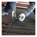 A person wearing MCR Safety Cut Pro 13G HyperMax Bi-polymer Gloves (92743BP) inspects jagged metal, while another person’s feet are seen in the background.