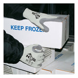 A person wearing MCR Safety Memphis Flex-Therm Gloves (9690) handles a "KEEP FROZEN" white box among similar boxes, likely in cold storage. The gloves are light gray and branded by MCR Safety.
