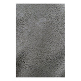 A close-up of the gray, textured surface with an intricate, maze-like pattern—much like the durable grip on MCR Safety Memphis Flex-Therm Glove 9690 (12 pairs)—creates an organic and abstract design.