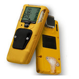 Two yellow WatchGas SST4-PUMP 4-Gas Detectors: one displays the digital screen with readings and buttons, the other shows the back with a clip and sensor port—ideal for multi-gas detection.