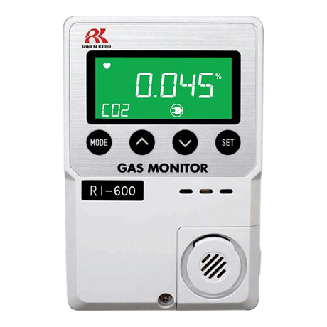 The RKI RI-600 Indoor CO2 Monitor from RKI Instruments features "0.045%" CO2 on a green display, buttons labeled "Mode," "Up," and "Set," and the brand logo top left, ensuring reliable indoor air quality monitoring.