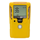 A yellow handheld WatchGas SST1 3 Year CO Gas Detector (SST1-M-36) with a digital screen displaying “36 MM CO.” The device features buttons and labels, including “watchgas,” “CO,” and “SST1.”.
