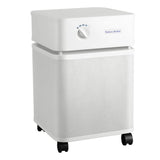 The Austin Air Systems Bedroom Machine B402 is a white, box-shaped air purifier with a top control knob, front ventilation holes, medical-grade HEPA filtration, and four black caster wheels.